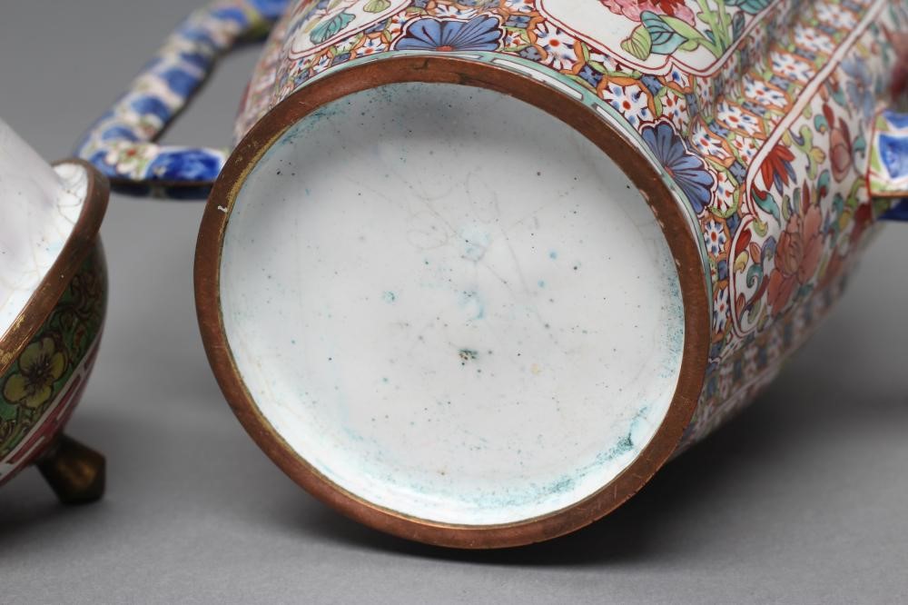 A CANTON ENAMEL WINE POT AND COVER of lobed cylindrical form with slender angular handle and curved Image