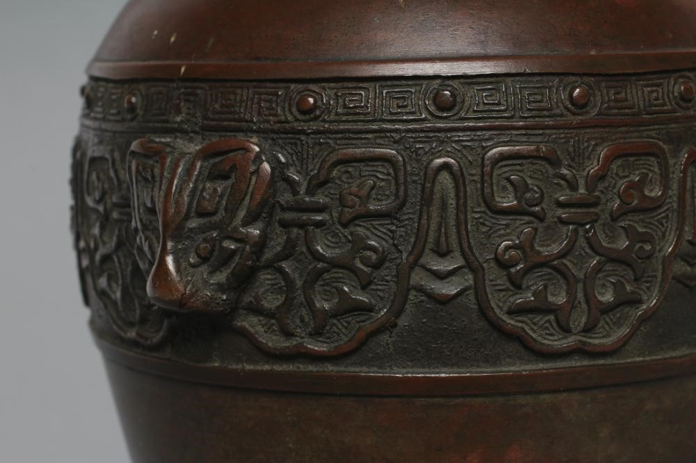 A CHINESE BRONZE VASE of ovoid form Image