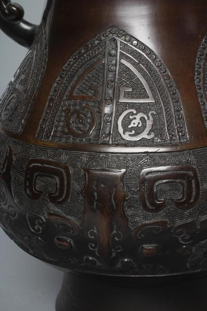 A CHINESE ARCHAIC STYLE BRONZE VASE of baluster form Image