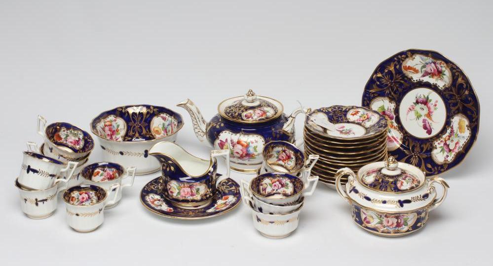 AN ENGLISH PORCELAIN FLUTED TEA SERVICE Image