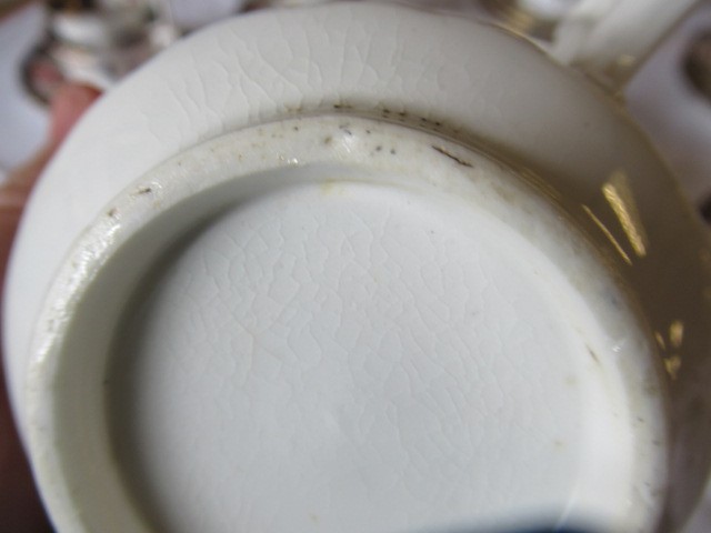AN ENGLISH PORCELAIN FLUTED TEA SERVICE Image
