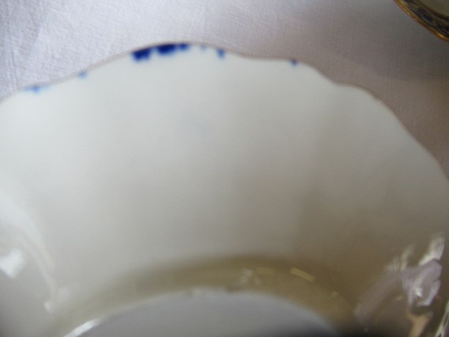 AN ENGLISH PORCELAIN FLUTED TEA SERVICE Image