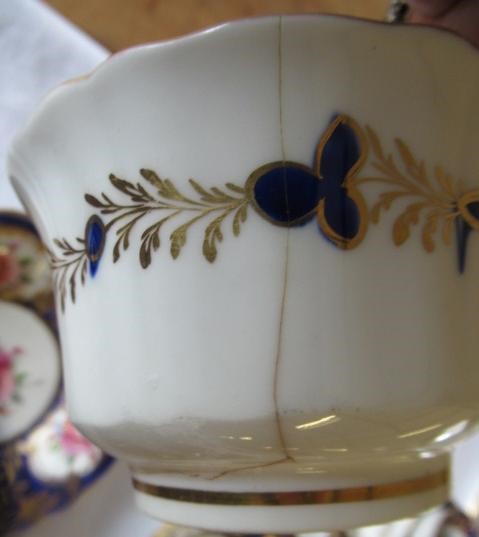 AN ENGLISH PORCELAIN FLUTED TEA SERVICE Image