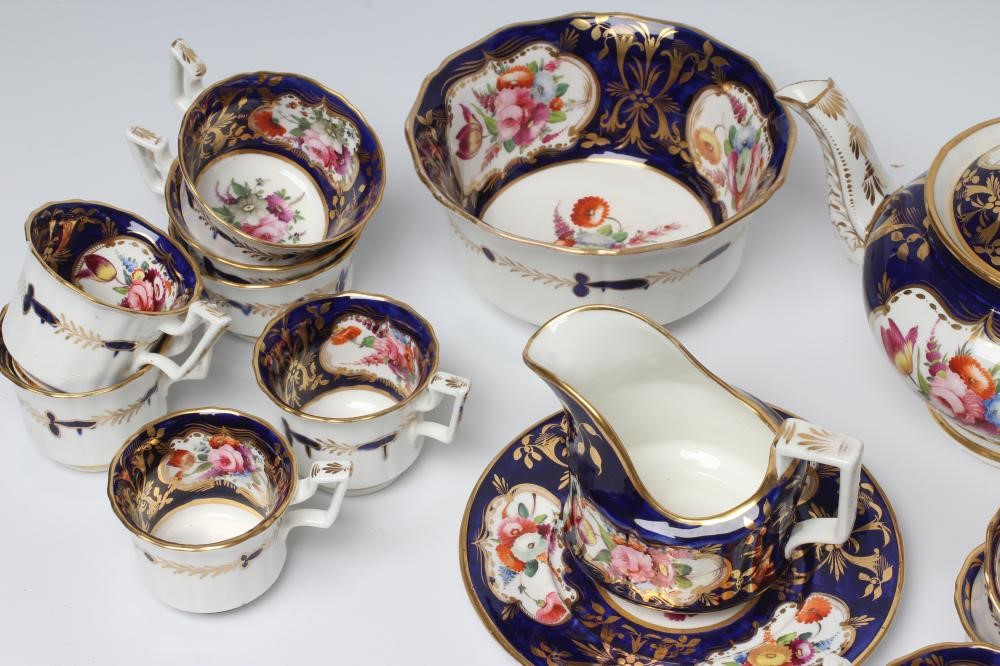 AN ENGLISH PORCELAIN FLUTED TEA SERVICE Image
