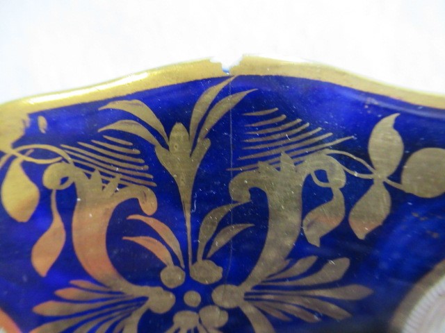 AN ENGLISH PORCELAIN FLUTED TEA SERVICE Image
