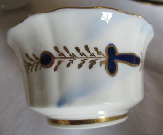 AN ENGLISH PORCELAIN FLUTED TEA SERVICE Image