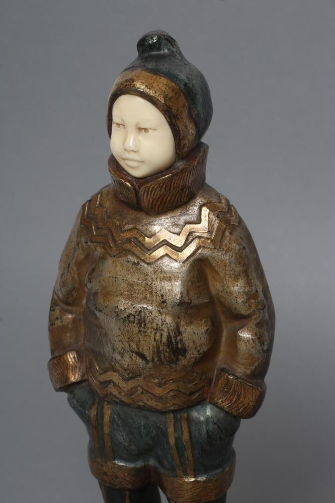 AFTER H. MABEL WHITE (1870-1948) an Art Deco bronze and ivory figure cast as a young Eskimo boy Image