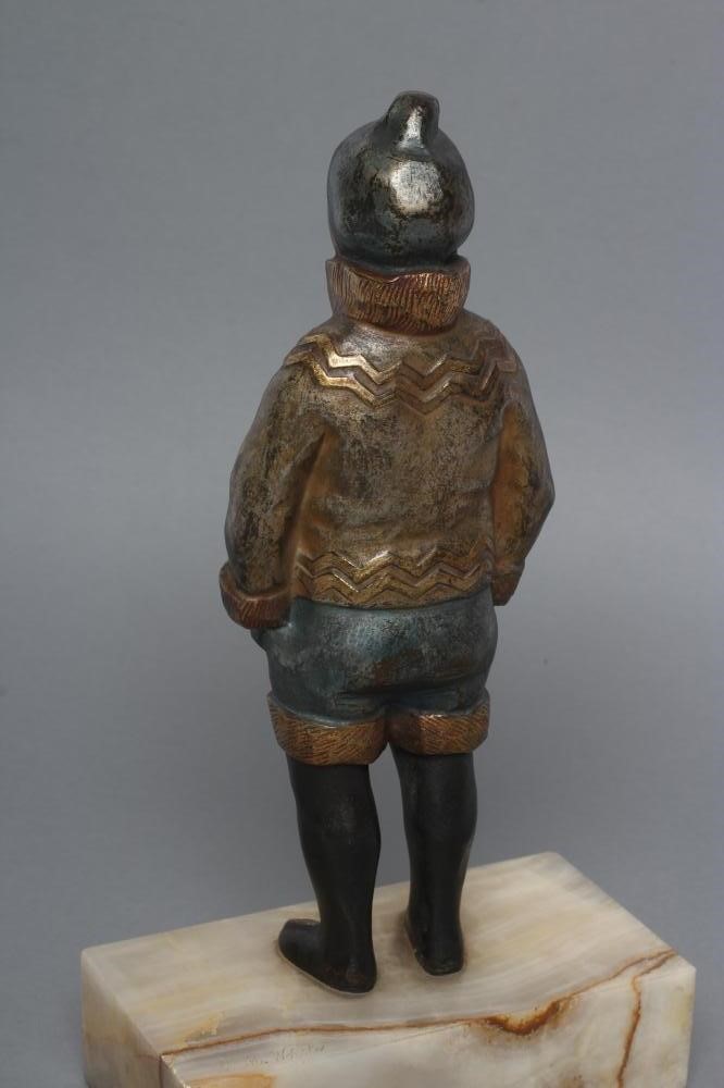 AFTER H. MABEL WHITE (1870-1948) an Art Deco bronze and ivory figure cast as a young Eskimo boy Image