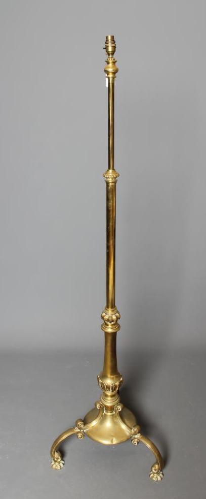 A BRASS STANDARD LAMP Image
