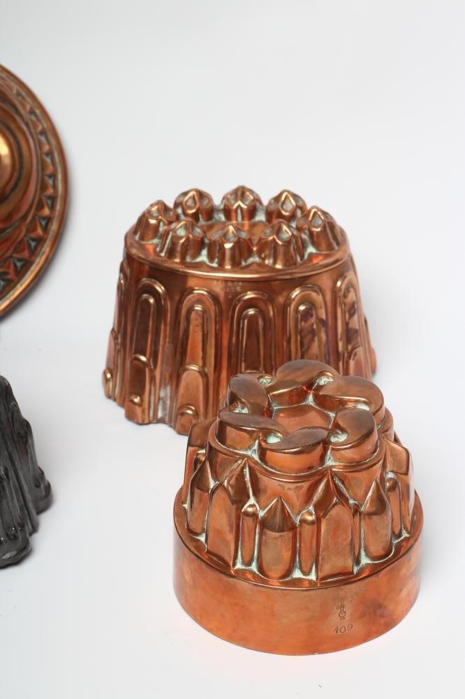 FIVE COPPER JELLY MOULDS Image