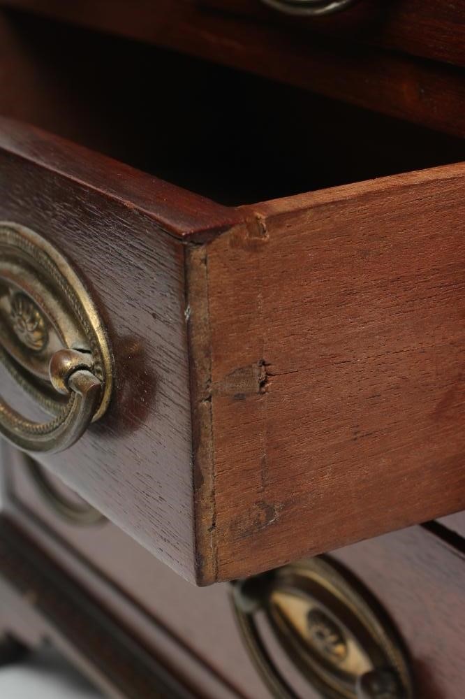 A MAHOGANY MINIATURE CHEST Image