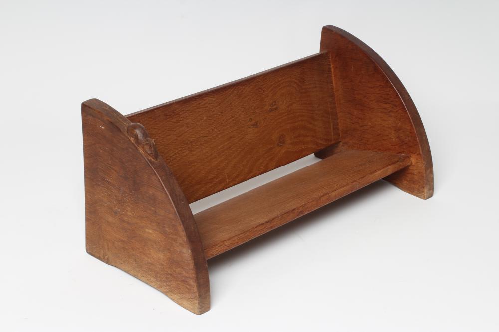 A ROBERT THOMPSON OAK BOOK TROUGH of oblong form with quadrant ends Image