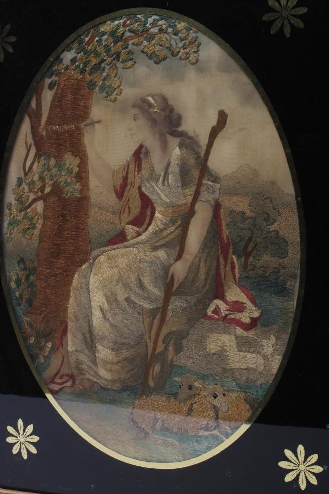 A PAIR OF GEORGIAN SILKWORK OVAL PANELS worked in coloured silks and chenille with various stitches Image