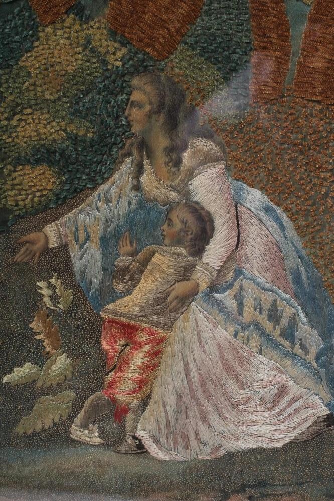 A GEORGIAN SILKWORK OVAL PANEL worked in coloured silks and chenille with various stitches depicting Image