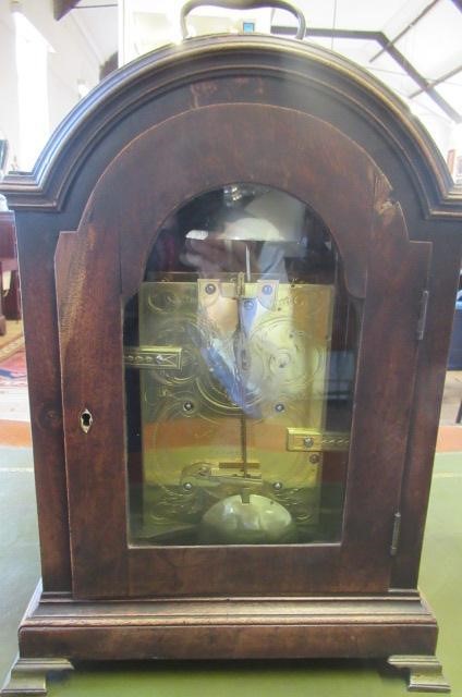 A MAHOGANY STRIKING TABLE CLOCK Image