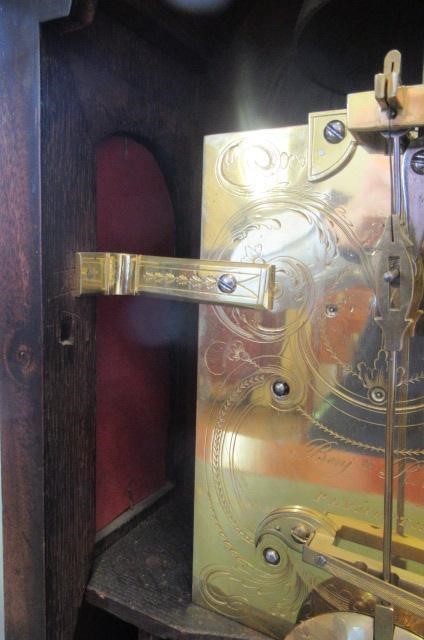 A MAHOGANY STRIKING TABLE CLOCK Image