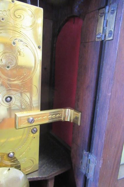 A MAHOGANY STRIKING TABLE CLOCK Image