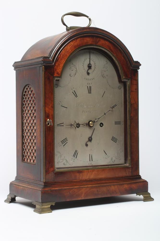 A MAHOGANY STRIKING TABLE CLOCK Image