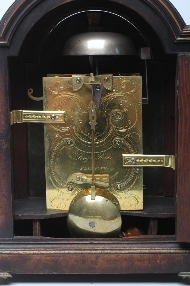 A MAHOGANY STRIKING TABLE CLOCK Image