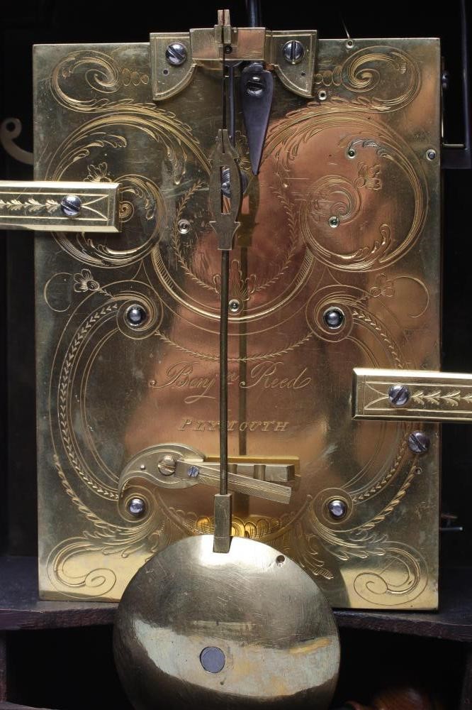 A MAHOGANY STRIKING TABLE CLOCK Image