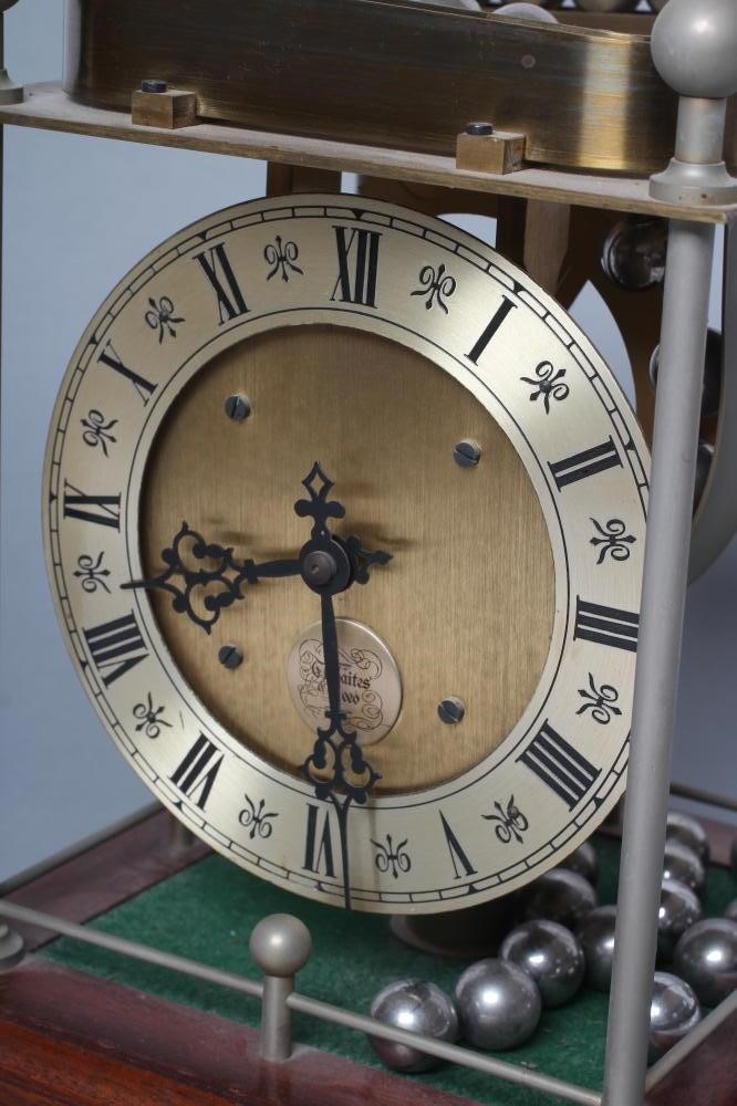 A THWAITES REED ROLLING BALL CLOCK Image