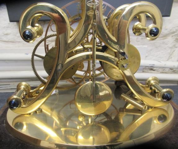 AN EPICYCLIC BRASS SKELETON CLOCK by Dent Image