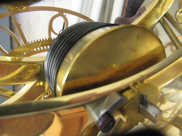 AN EPICYCLIC BRASS SKELETON CLOCK by Dent Image