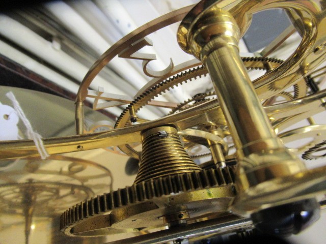 AN EPICYCLIC BRASS SKELETON CLOCK by Dent Image