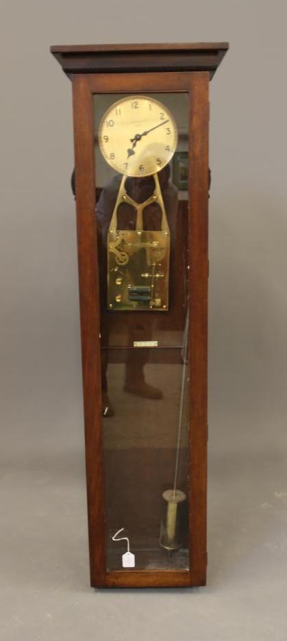 A MAHOGANY CASED ELECTRIC REGULATOR signed H.W. Mallett 1929 Image