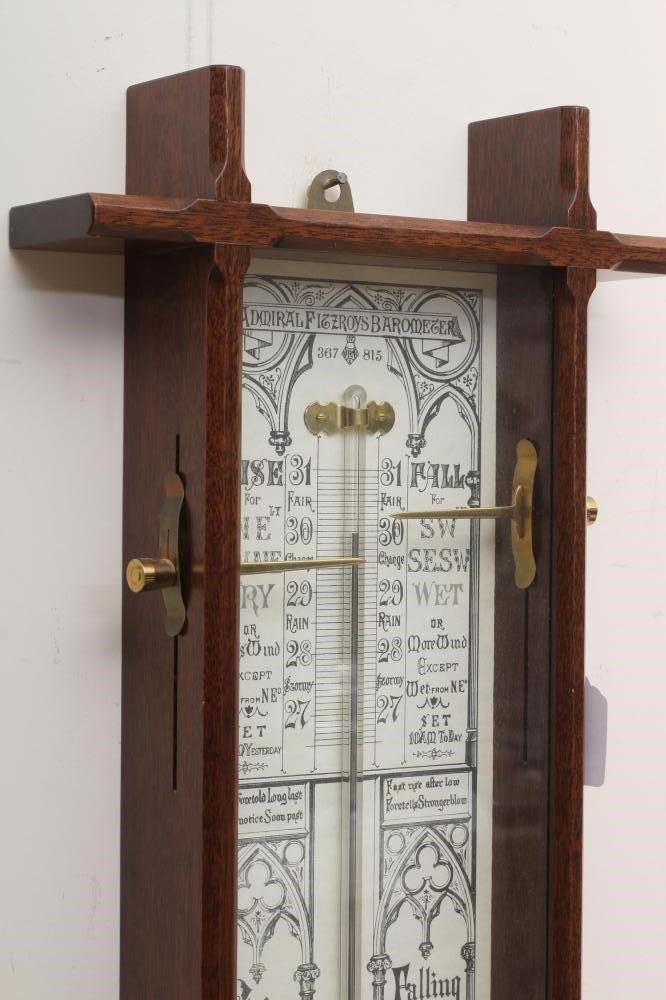 AN ADMIRAL FITZROY MERCURY BAROMETER with thermometer and Gothic style paper registers in chamfered Image