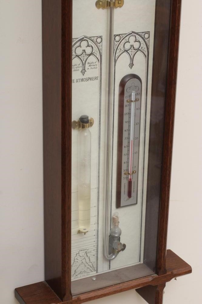 AN ADMIRAL FITZROY MERCURY BAROMETER with thermometer and Gothic style paper registers in chamfered Image