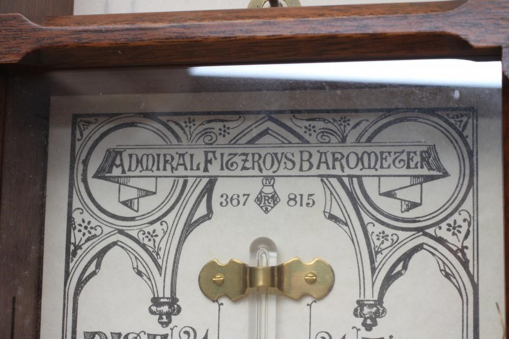 AN ADMIRAL FITZROY MERCURY BAROMETER with thermometer and Gothic style paper registers in chamfered Image