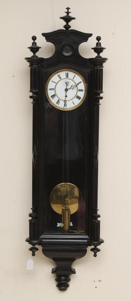 AN EBONISED CASED VIENNA WALL CLOCK Image
