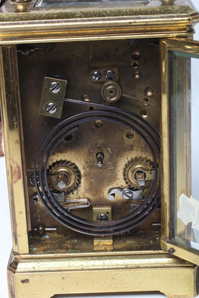 A BRASS CASED CARRIAGE CLOCK Image