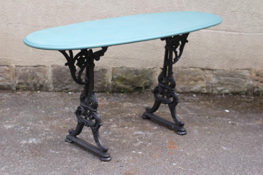 A CAST IRON GARDEN TABLE Image