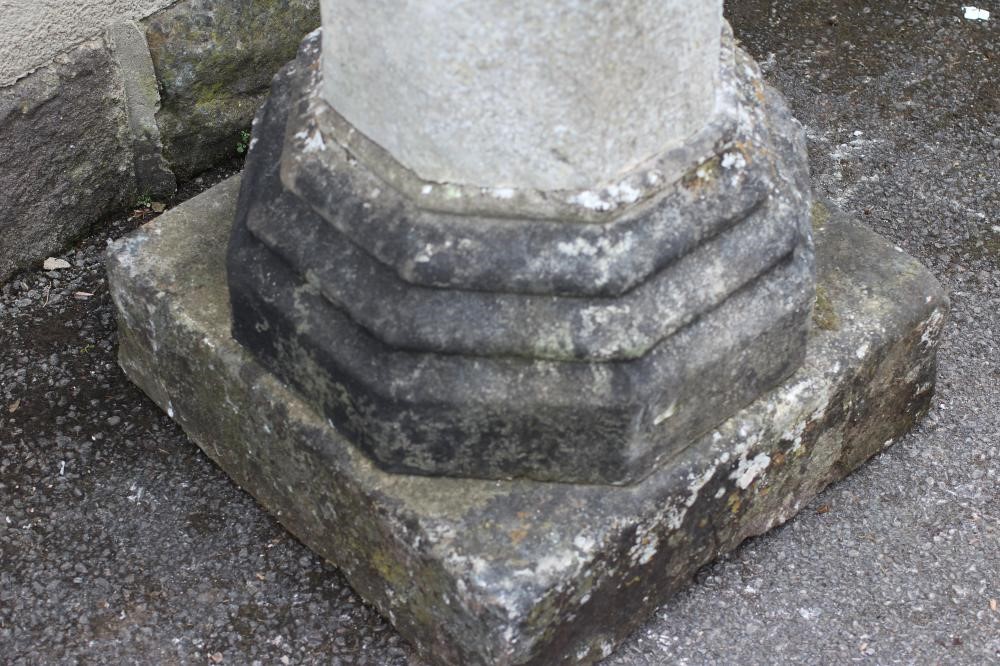 A SANDSTONE MEMORIAL COLUMN of octagonal form with moulded top and base Image