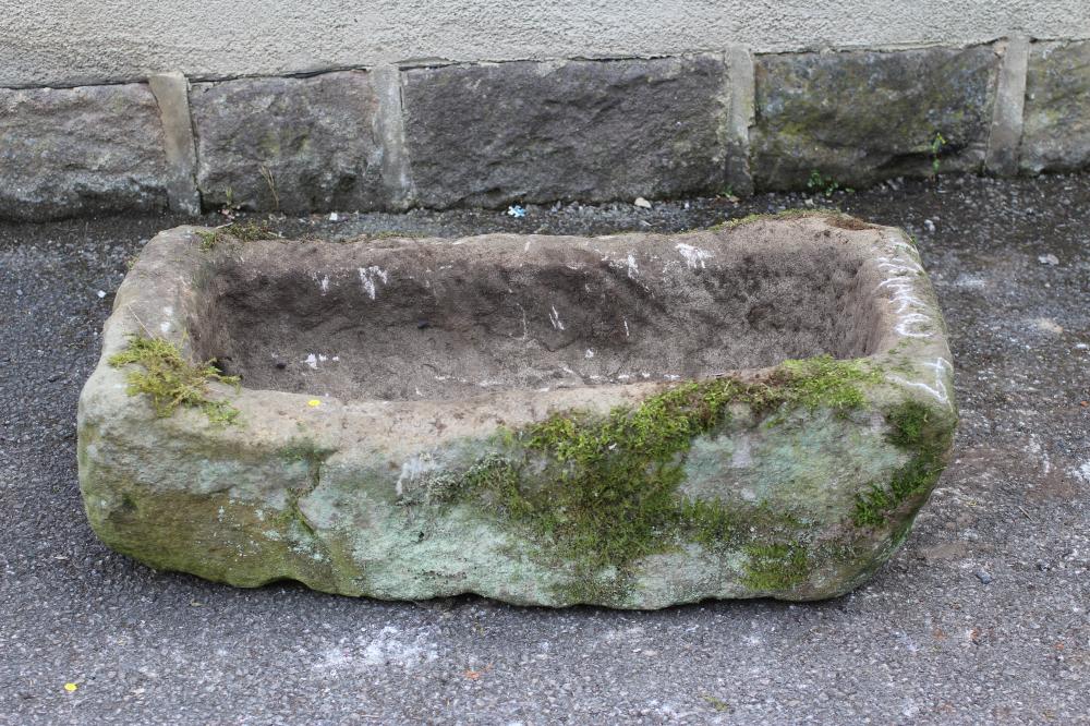 A SANDSTONE TROUGH of rough hewn oblong form Image