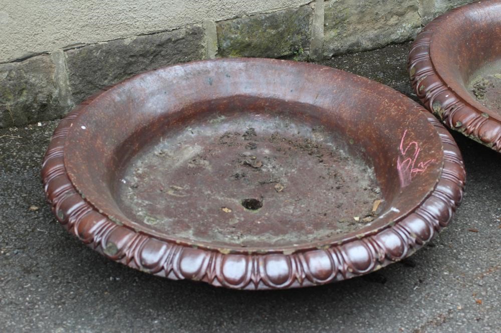 A PAIR OF LARGE SALT GLAZED POTTERY FOUNTAIN TRAYS of shallow circular form with egg and dart Image