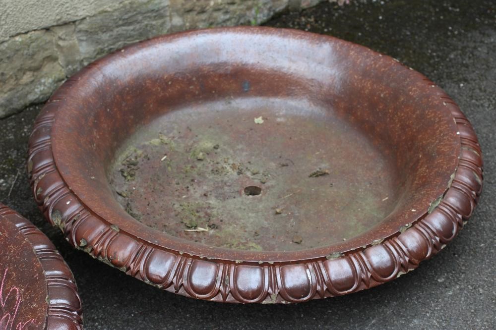A PAIR OF LARGE SALT GLAZED POTTERY FOUNTAIN TRAYS of shallow circular form with egg and dart Image