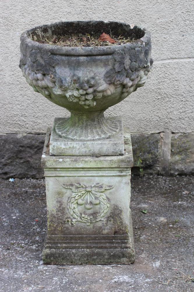 A COMPOSITION STONE URN Image
