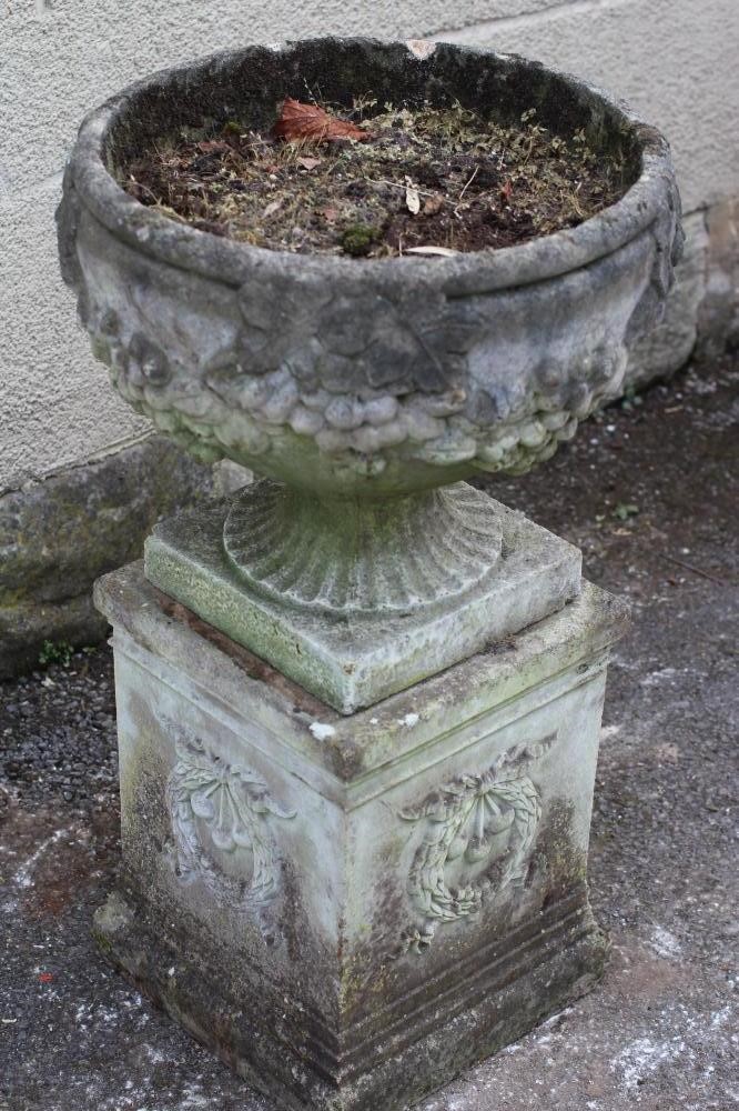 A COMPOSITION STONE URN Image