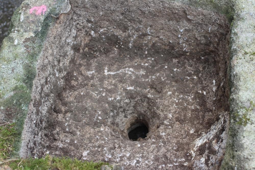 A GRITSTONE TROUGH of rough hewn square form Image