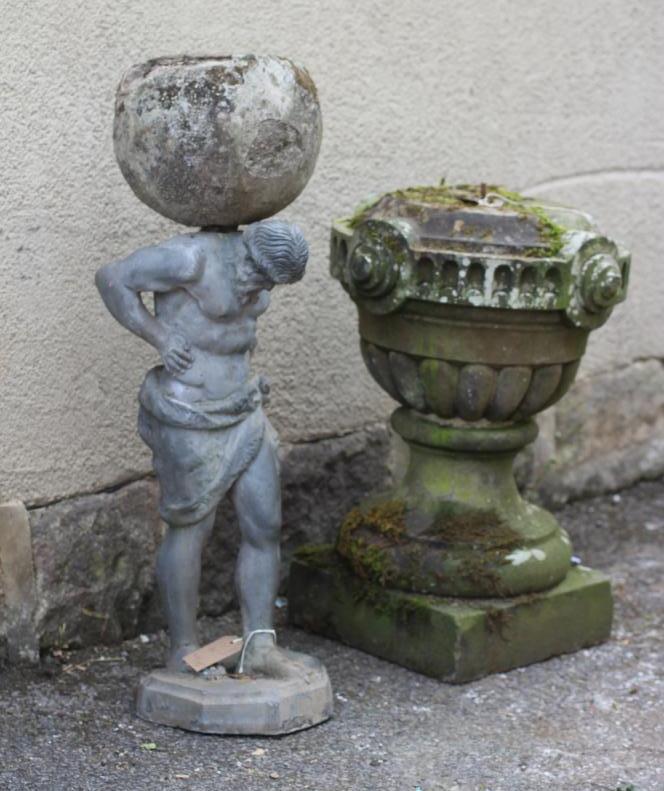 A SANDSTONE STAND of vase form with lobed banding Image