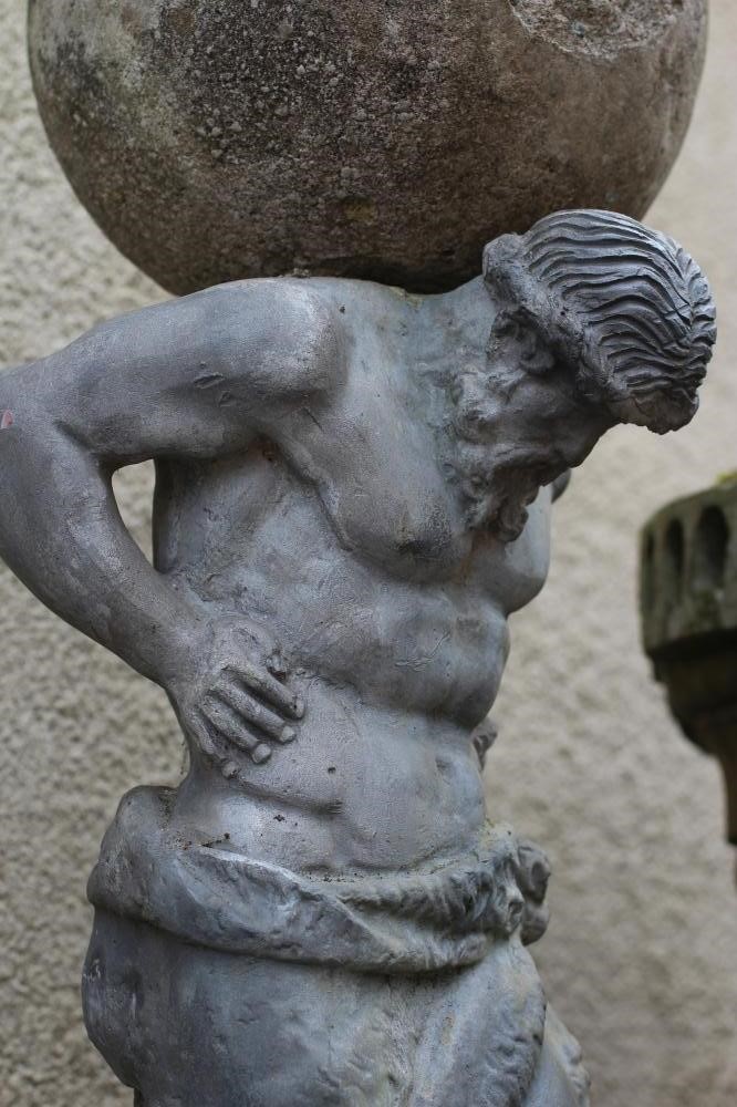 A SANDSTONE STAND of vase form with lobed banding Image