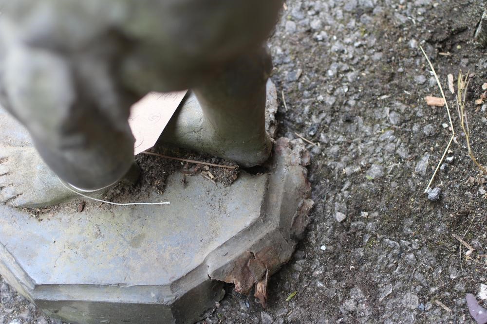 A SANDSTONE STAND of vase form with lobed banding Image