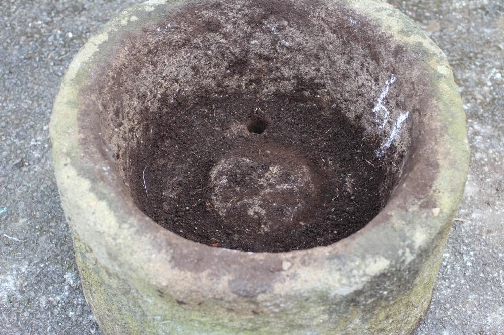 A GRITSTONE TROUGH of circular form Image