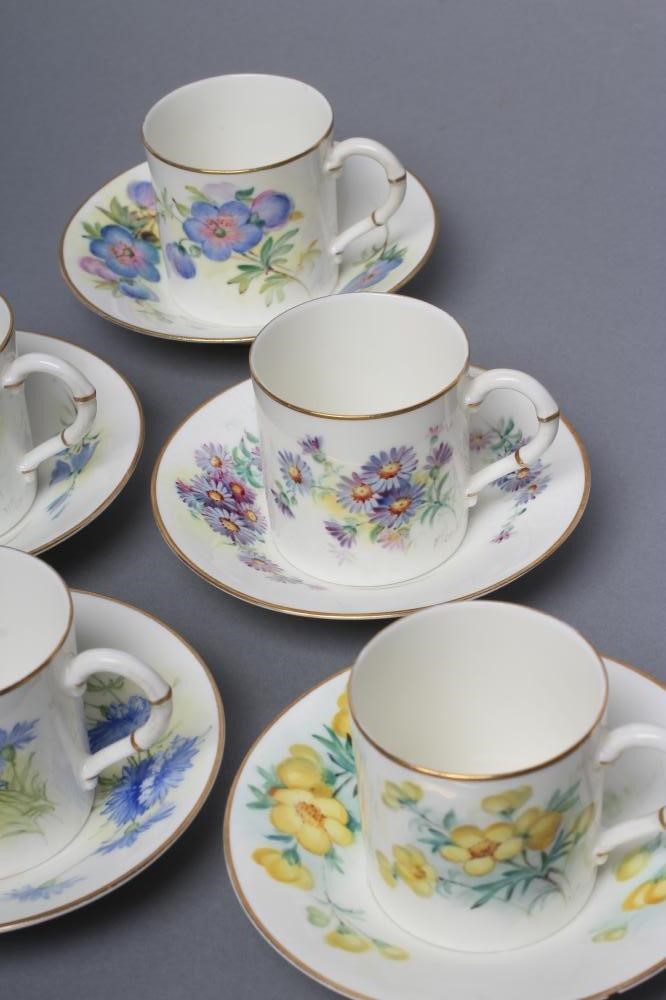 A SET OF FOUR ROYAL WORCESTER CHINA COFFEE CANS AND SAUCERS Image