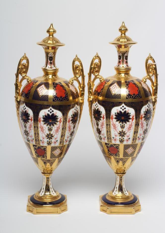 A PAIR OF ROYAL CROWN DERBY CHINA IMARI PATTERN URNS Image