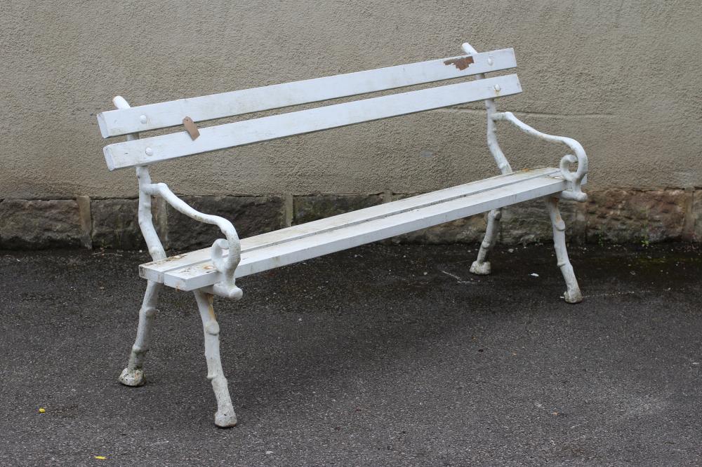 A CAST IRON GARDEN BENCH Image