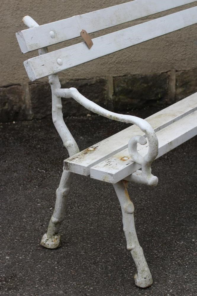 A CAST IRON GARDEN BENCH Image